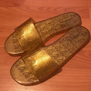 Victoria’s Secret gold glitter slides